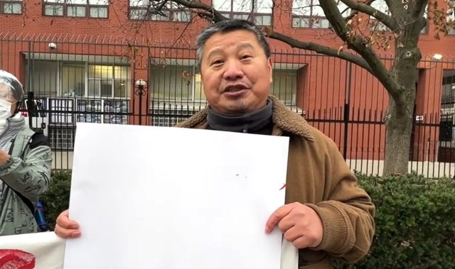 Toronto demonstrators stand with China’s ‘white paper revolutionaries’ opposing never-ending COVID lockdowns