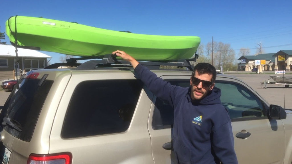 This video is a quick demonstration of how to properly secure one of our kayak rentals to your car if you have a luggage rack with bars on your vehicles rooftop.