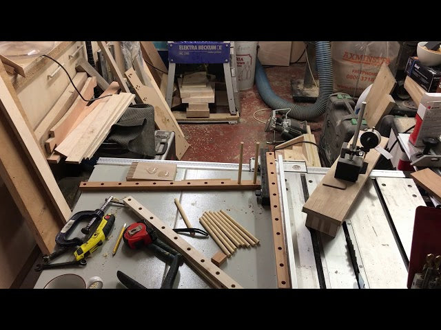 Wooden tie rack made from odd bits of timber.