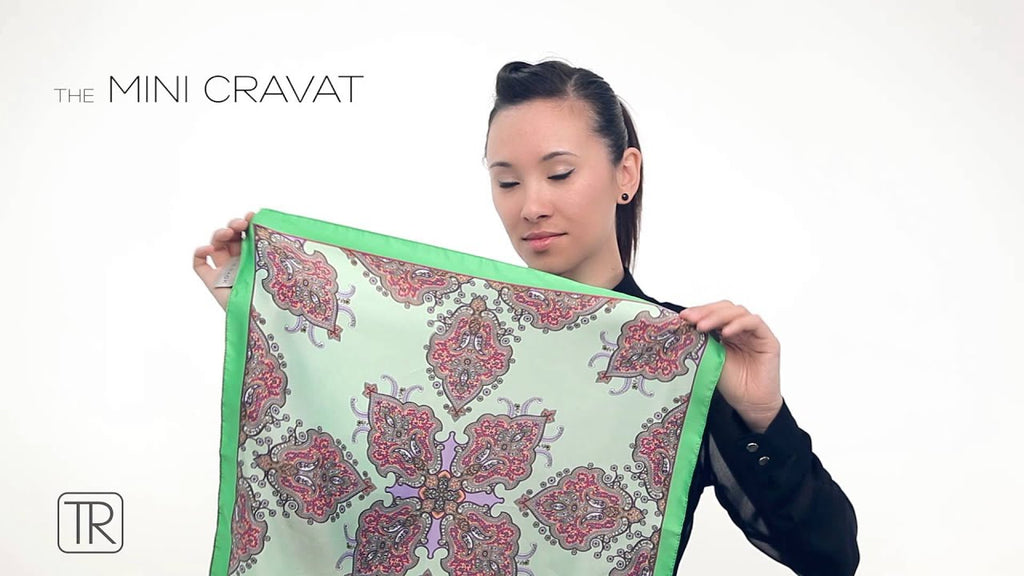 Watch this guide and learn how to wear The Essential Printed Scarf