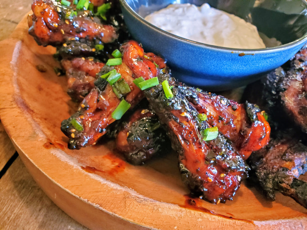 Coal-Roasted Chicken Wings with Buffalo Sauce and Blue Cheese Dressing