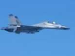 Chinese fighter jet guided-missile destroyer threaten US reconnaissance aircraft South China Sea